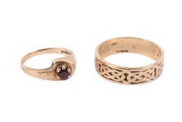 Two 9ct gold rings. Comprising a Celtic band with engraved decoration, size V/W, weight 4.