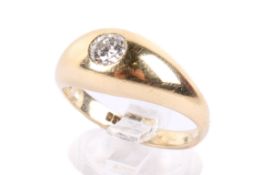 A 9ct gold and diamond ring. The round cut diamond of circa 0.