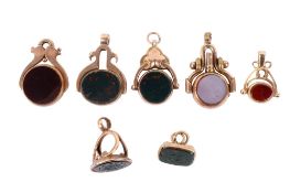 Seven Georgian and later 9ct gold and stone fobs.