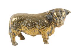 A contemporary solid brass figure modelled as a bull. H15cm.