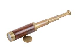 A reproduction three drawers brass telescope.