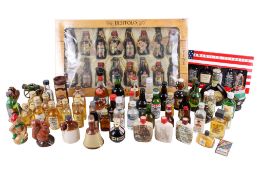 A large group of miniature bottles of alcohol.