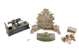 A group of metal writing accessories and other collectables.