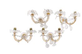 A set of four mid-century glass crystal wall lights. Each with two branches and drop crystals.