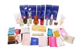 A collection of assorted women's fashion fragrances.