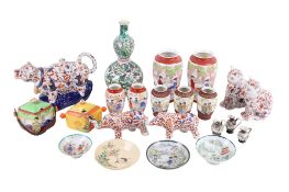 A collection of Japanese ceramics. Including vases, animals, teapots, etc.