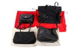 Four designer women's handbags. Some leather, including Bally, all with dust bags.