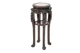 A Chinese carved wood pot stand.