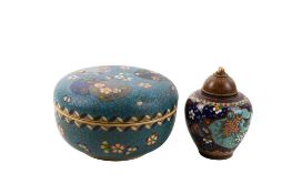 An early 20th century Japanese lidded box and a pot.