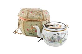 A mid-century Chinese teapot and embroidered cover.