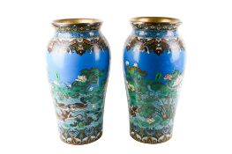 A pair of large Japanese Meiji period blue ground cloisonné vases.
