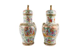 A pair of late 19th century Chinese Canton baluster vases.