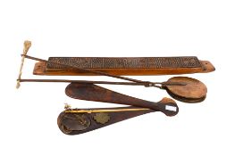 A Korean weighing scales, biscuit press and pancake press.
