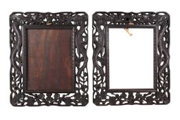 A pair of Chinese carved hardwood picture frames.