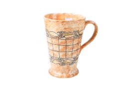 A Charlotte Rhead Burleigh pottery jug. On a sponged ground.