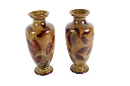 Pair of Royal Doulton stoneware leaf vases.