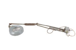 A vintage desk magnifying glass multi-poise work lamp. By Thousand & One Lamps Ltd.