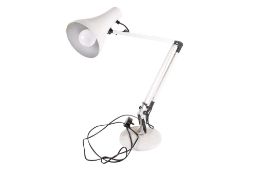 A modern multi-poise white desk lamp. Raised on a circular base, adjustable height.