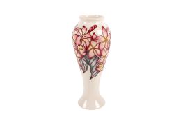 Modern dated trial Moorcroft Frangipani vase on a cream ground. Designed by Emma Bossons, 'Trial' 4.