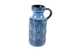 A mid-century Scheurich Keramik West German pottery vase. With applied handle on a blue ground.