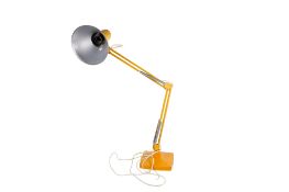 A mid-century yellow HCF Denmark HB4 multi-poise desk lamp. Raised on a heavy square base.