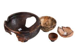 A group of four assorted wooden hand turned bowls. Various sizes and types of wood. Max.
