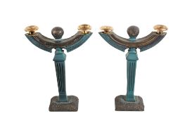 A pair of candelabra. Each having two sconces with a fluted tapering square column.