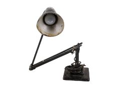 A vintage Herbert Terry Anglepoise lamp. In black, having a square two step base.