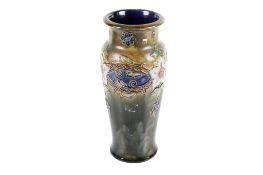 A large Royal Doulton stoneware vase.