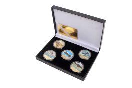 A set of five 24K gold plated RAF themed coins.