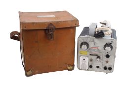 A Dawe Instruments Ltd Admiralty strobe flash. Pattern 0557/197383, in a fitted leather case.