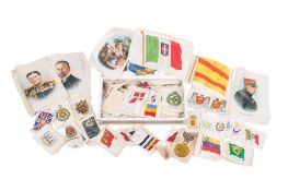 A collection of vintage silk military badges.