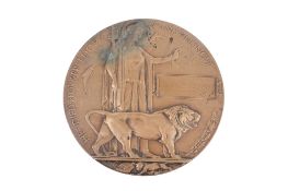 A WWI bronze memorial death plaque. Awarded to Samuel Bevan, Diameter 12cm.