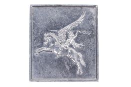 A souvenir fund raising metal ticket featuring the logo of the British 1st Airborne Division and