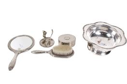 A group of five silver plated items.
