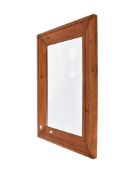 A pine framed rectangular wall mirror.