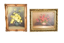 Two floral still life oil paintings, one signed Suzanna. Both framed, max.