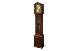 A contemporary Tempus Fugit longcase clock.