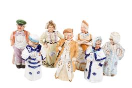 A group of seven assorted Staffordshire ceramic nodding figures. Max.