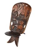 African tribal carved hardwood birthing chair.