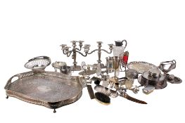 A box of assorted silver plated tableware items.