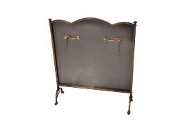 An Art Deco style fire screen.
