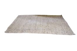 A large modern wool beige and grey ground rug.