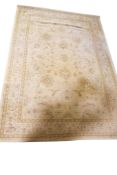 Contemporary Viscount Belgium made beige ground rug. Floral borders and flower motif to the centre.