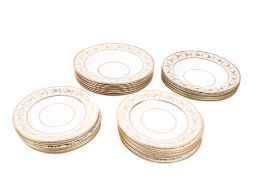 A set of Flight Barr & Barr, Worcester gilt porcelain dinner plates and matching Booths bowls. Max.
