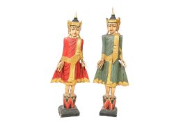 Pair of craved polychrome decorated south Asian temple figures.