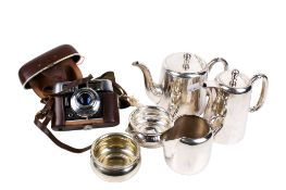 Vintage film camera and a five piece silver plated tea service.