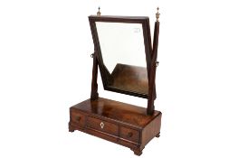 Early Victorian mahogany swing mirror.