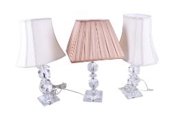 A pair of Maison glass table lamps and another