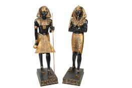 A pair of modern composite floor standing Egyptian figures.